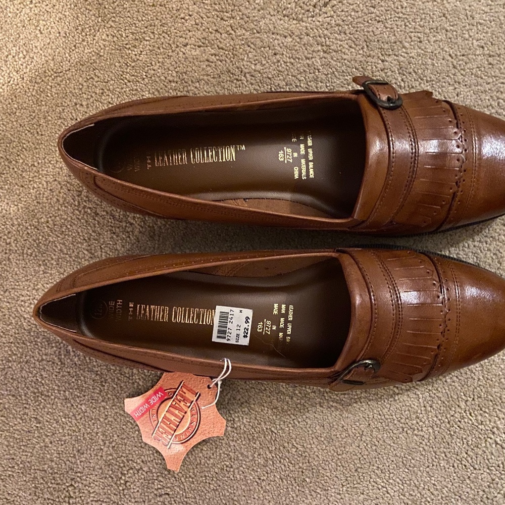 New brown leather size 12 wide ladies flats.  Tags attached.